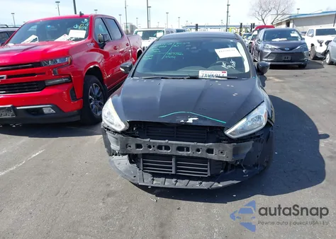 2016 Ford Focus Titanium z USA, uszkodzony, nr VIN 1FADP3J20GL362231